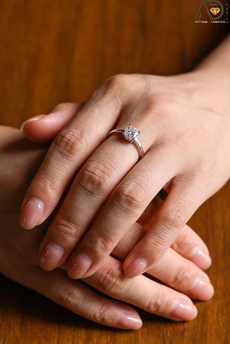 Celebrate your love with our chic Solid Gold Cushion Cut Moissanite Engagement Ring. The bar setting adds a modern touch, making it an ideal anniversary gift, promise ring, or birthday surprise for her.