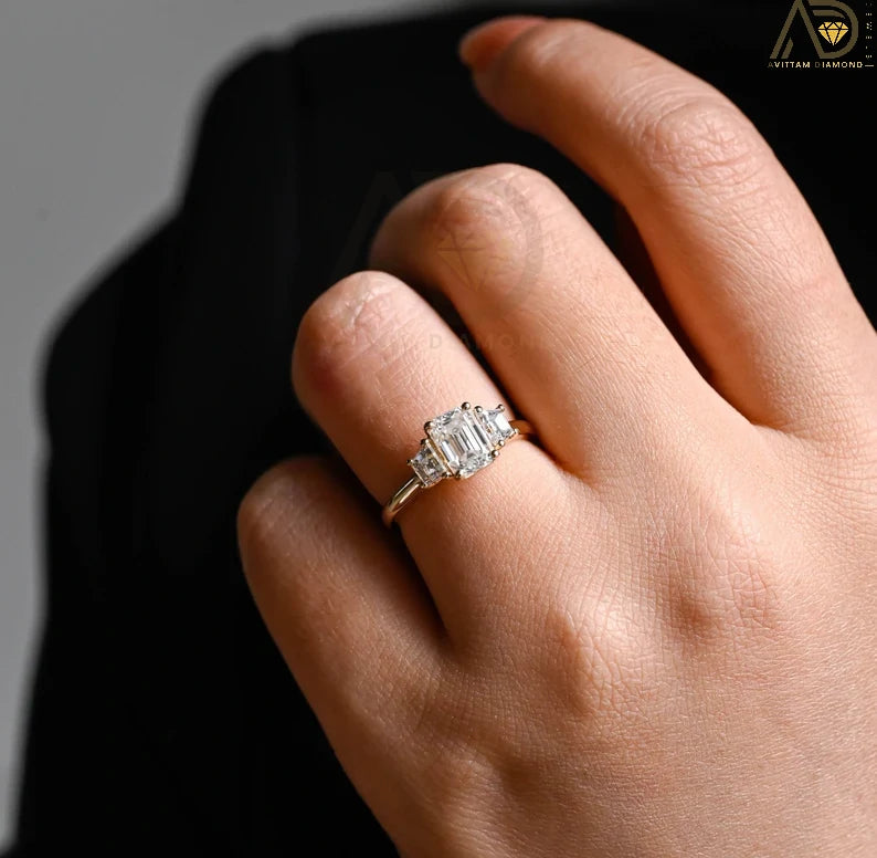 Elegant Moissanite Engagement Ring |
Solid Gold Emerald Cut Ring |
Moissanite Ring with Trapezoid Stones
