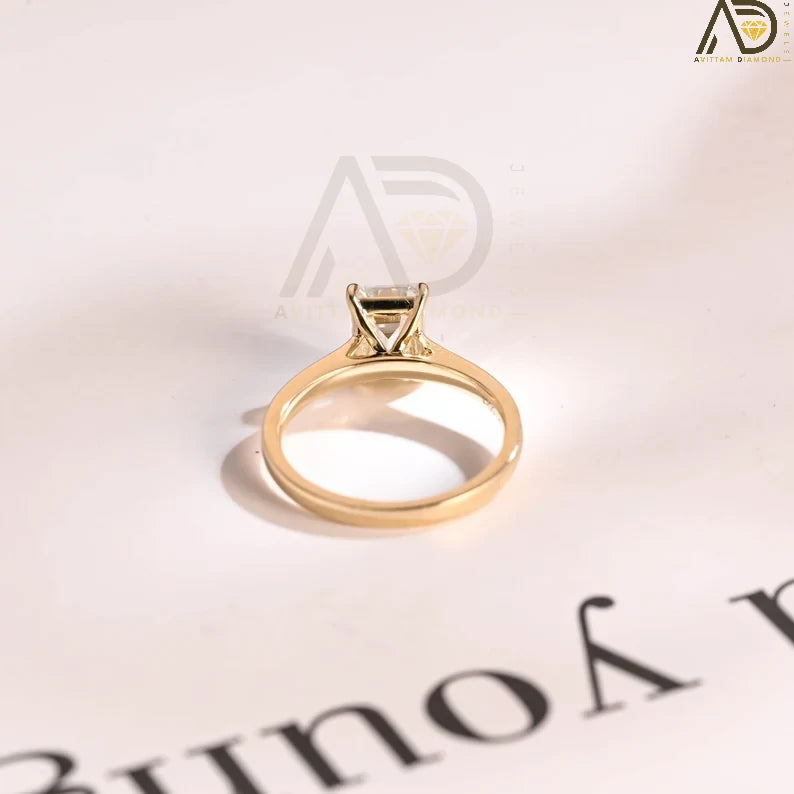 Yellow Gold Emerald Cut Moissanite Engagement Ring – a stunning anniversary or promise ring designed for women with classic taste. Perfect for special occasions!