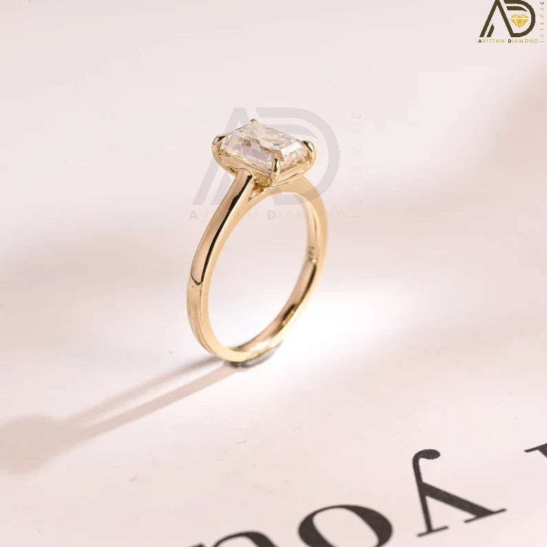 Yellow Gold Emerald Cut Moissanite Engagement Ring – a stunning anniversary or promise ring designed for women with classic taste. Perfect for special occasions!