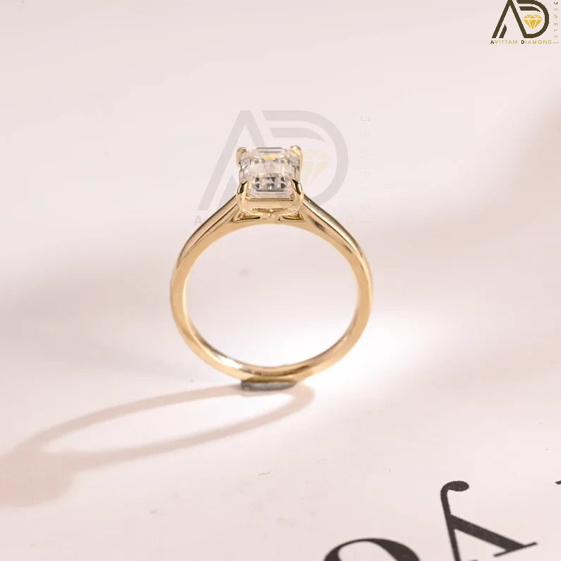Yellow Gold Emerald Cut Moissanite Engagement Ring – a stunning anniversary or promise ring designed for women with classic taste. Perfect for special occasions!