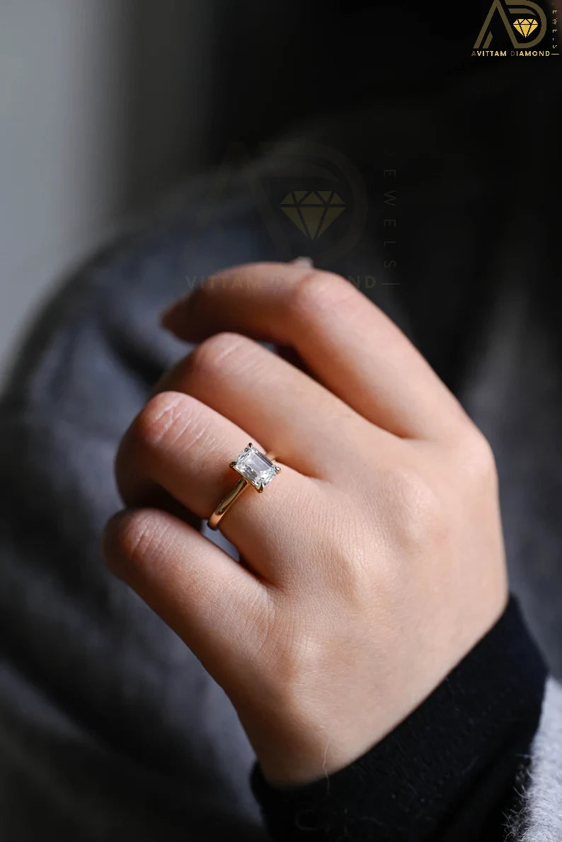 Yellow Gold Emerald Cut Moissanite Engagement Ring – a stunning anniversary or promise ring designed for women with classic taste. Perfect for special occasions!