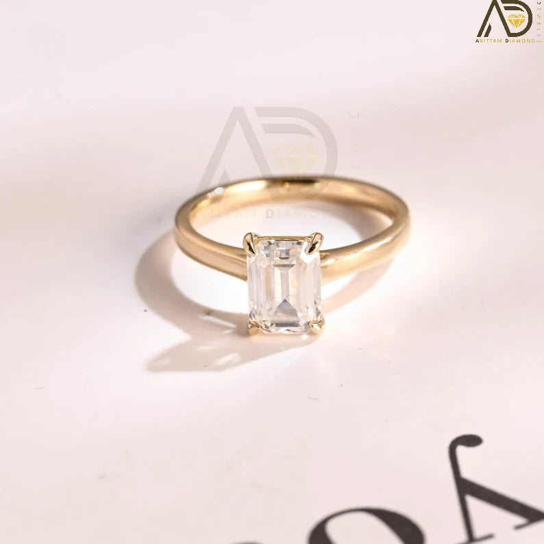 Yellow Gold Emerald Cut Moissanite Engagement Ring – a stunning anniversary or promise ring designed for women with classic taste. Perfect for special occasions!