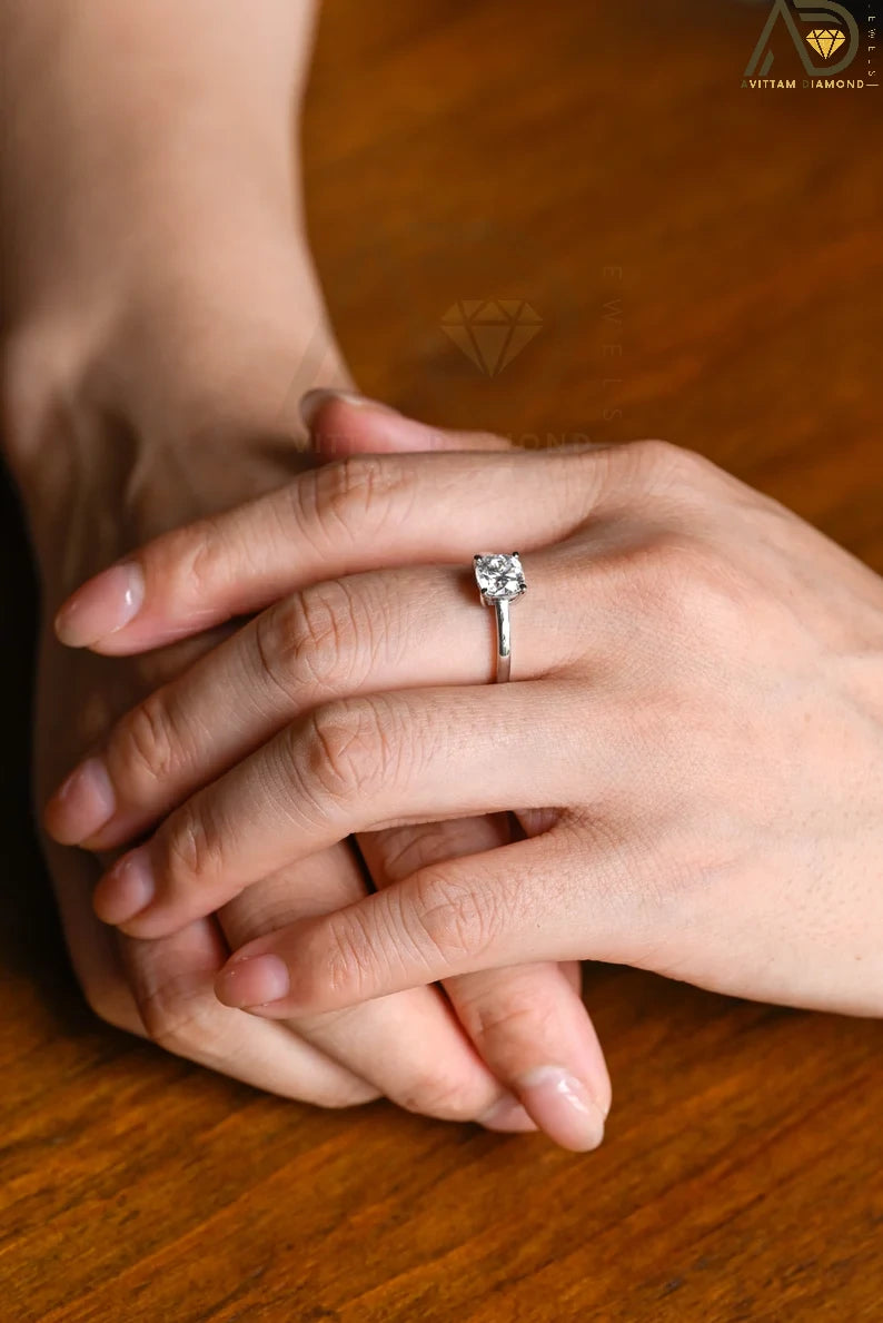 Celebrate your love with our chic Solid Gold Cushion Cut Moissanite Engagement Ring. The bar setting adds a modern touch, making it an ideal anniversary gift, promise ring, or birthday surprise for her.