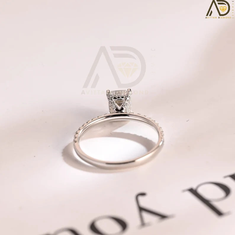 Discover the elegance of this solid gold minimalist engagement ring featuring a stunning emerald-cut Moissanite stone. Perfect for proposals, anniversaries, and birthdays, this luxury ring is an ideal gift for women.
