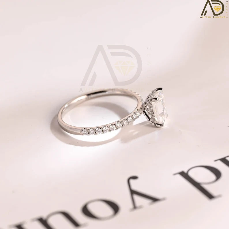 Discover the elegance of this solid gold minimalist engagement ring featuring a stunning emerald-cut Moissanite stone. Perfect for proposals, anniversaries, and birthdays, this luxury ring is an ideal gift for women.