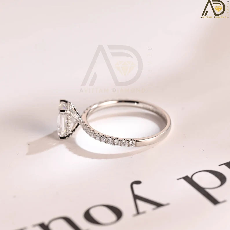Discover the elegance of this solid gold minimalist engagement ring featuring a stunning emerald-cut Moissanite stone. Perfect for proposals, anniversaries, and birthdays, this luxury ring is an ideal gift for women.