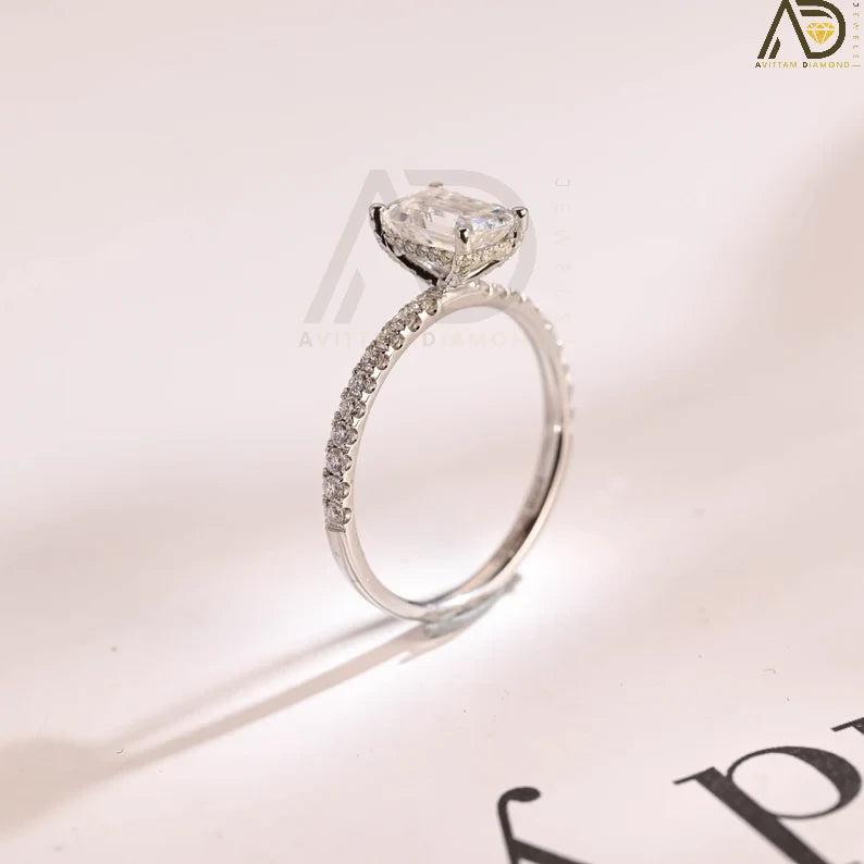 Discover the elegance of this solid gold minimalist engagement ring featuring a stunning emerald-cut Moissanite stone. Perfect for proposals, anniversaries, and birthdays, this luxury ring is an ideal gift for women.
