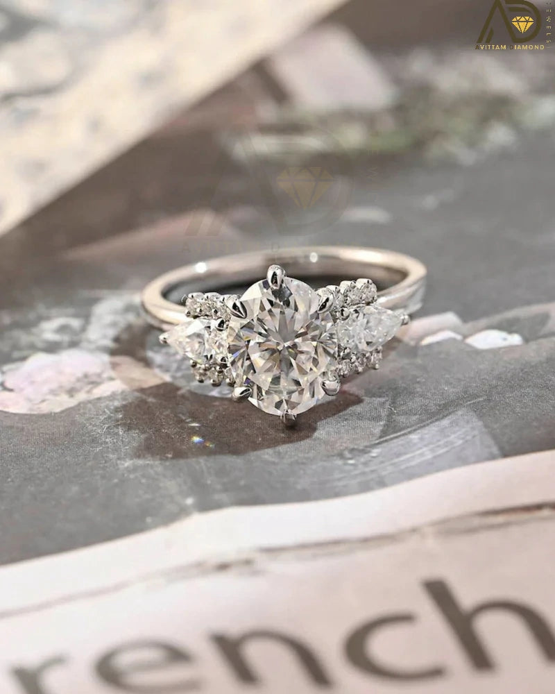 Discover our stunning Solitaire Diamond Ring with a bezel setting, featuring a captivating 14K solid gold oval cut moissanite. A perfect choice for engagement or special occasions!