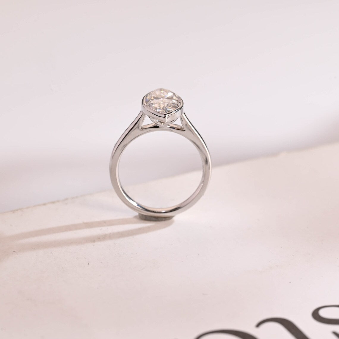 Bezel set moissanite ring