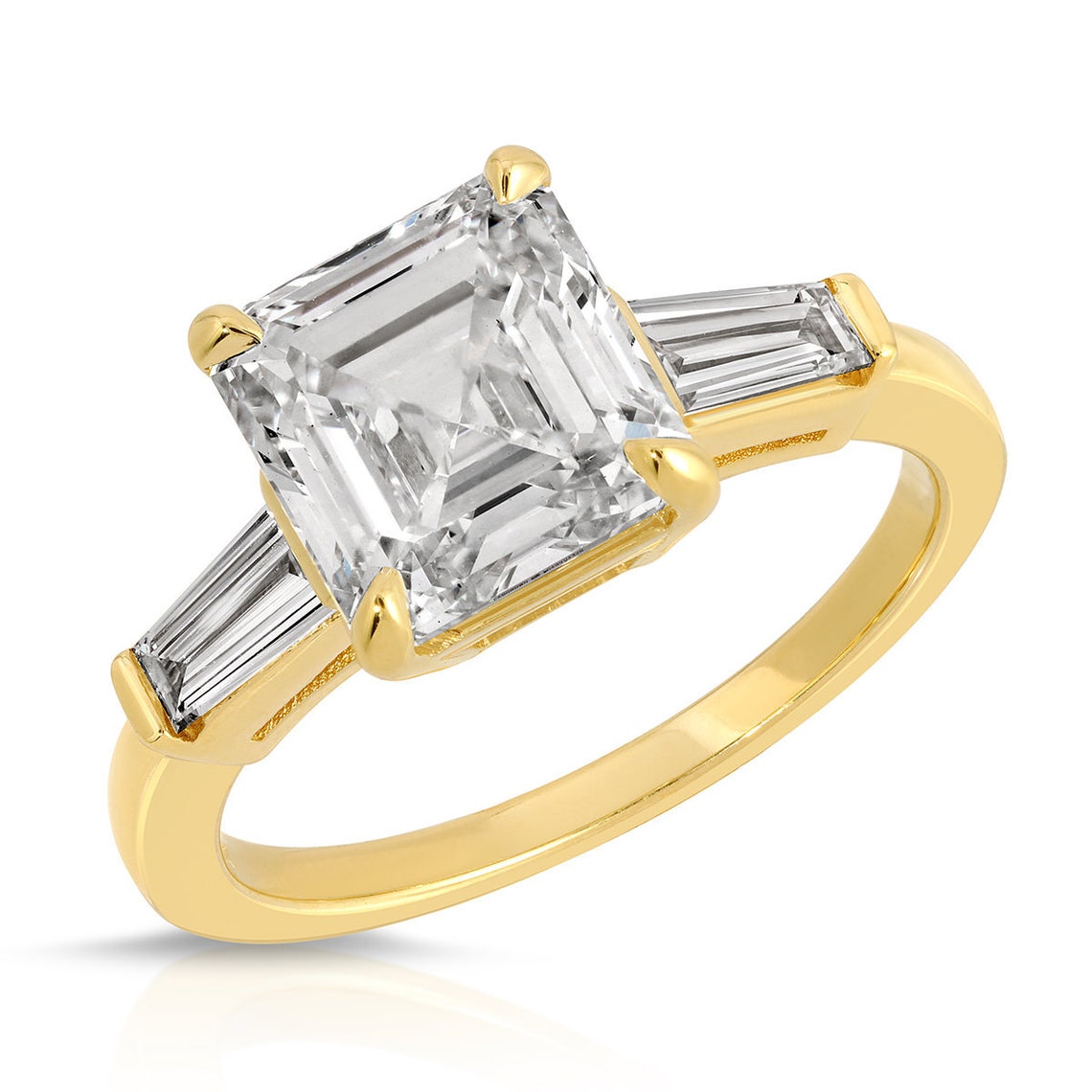Three stone engagement ring