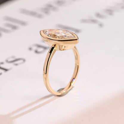 Bezel set engagement ring