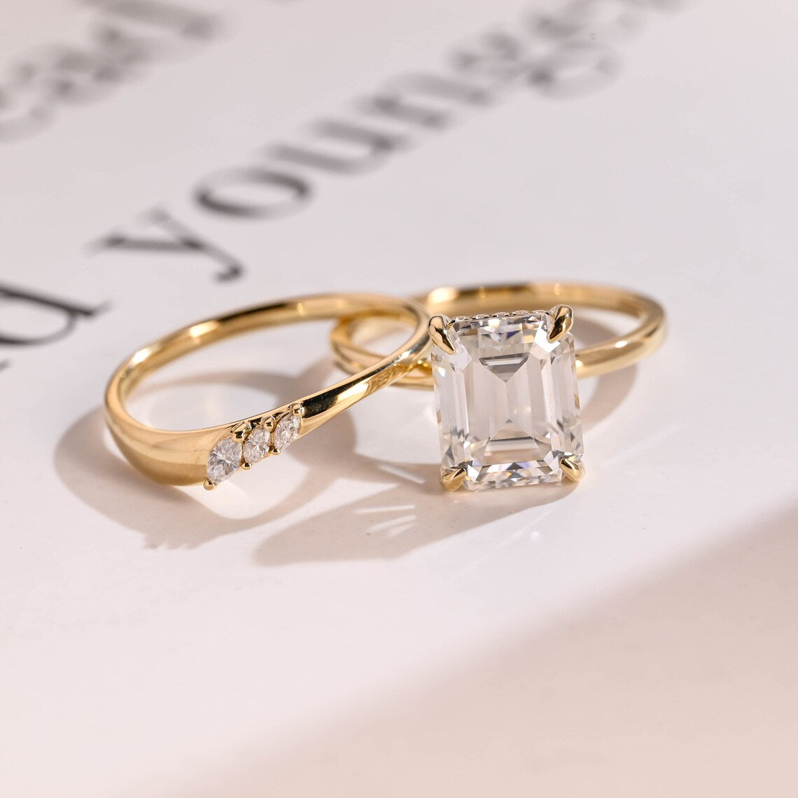 Emerald cut moissanite ring