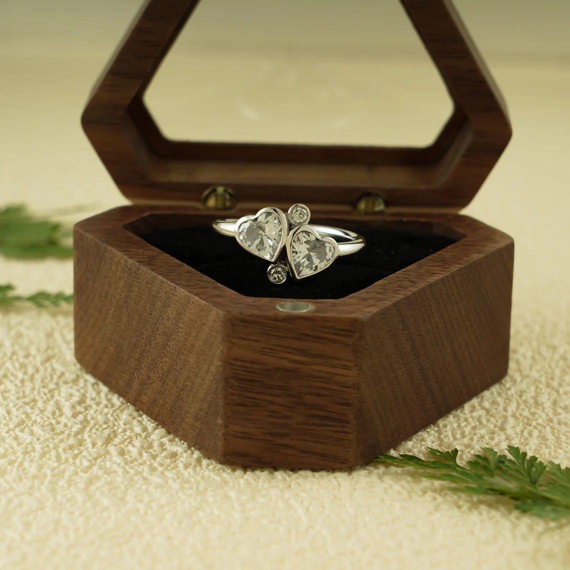 Bezel two heart cut diamond ring