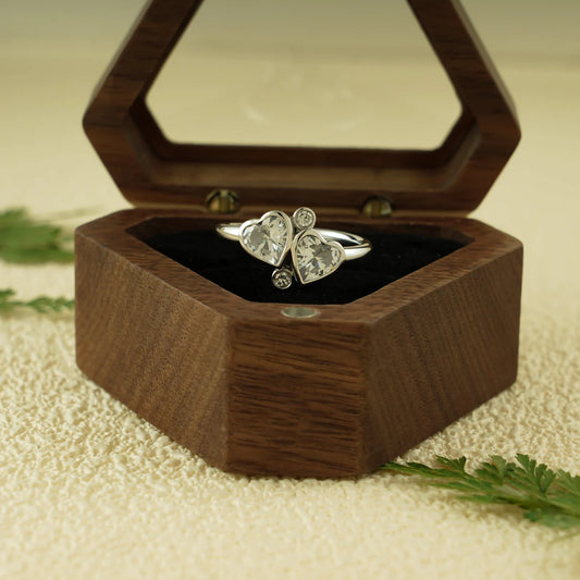 Bezel two heart cut diamond ring