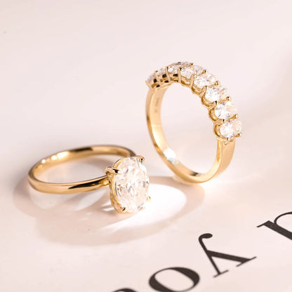 Oval half eternity wedding band