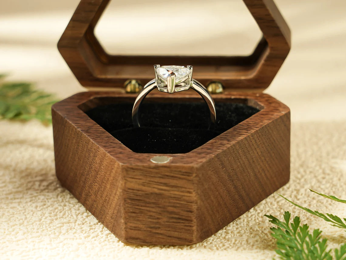 Moissanite solitaire ring