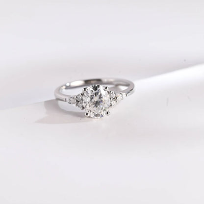 Oval Moissanite Seven-Stone Pear & Round Cluster Accent Bridal Ring