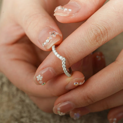 Unique curved band ring