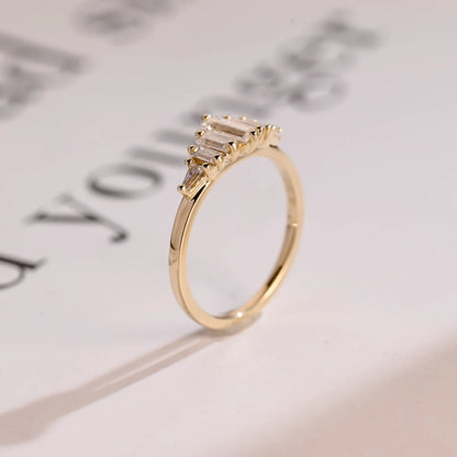 Tripod baguette moissanite ring