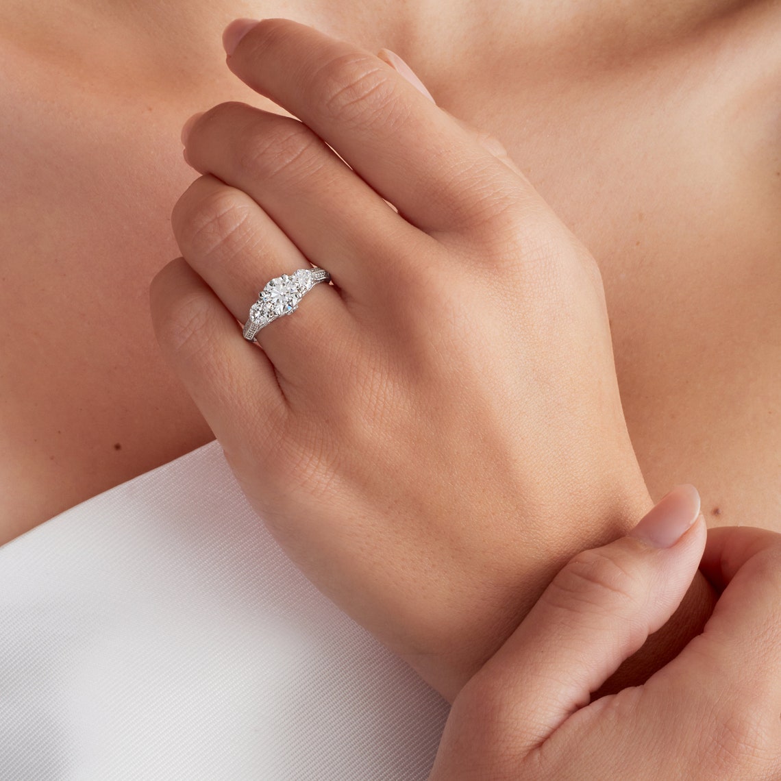 Three stone round cut lab grown ring