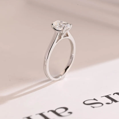 modern white gold ring | sleek solitaire band | elegant oval ring
