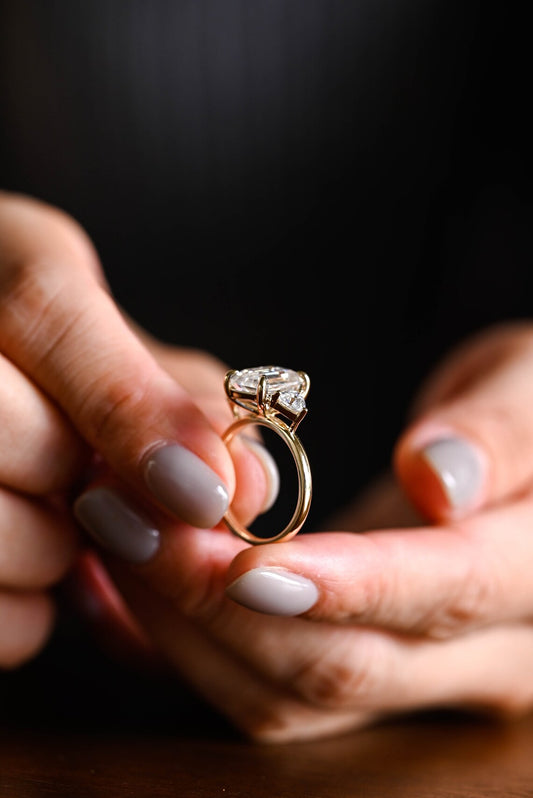 Emerald cut moissanite ring
