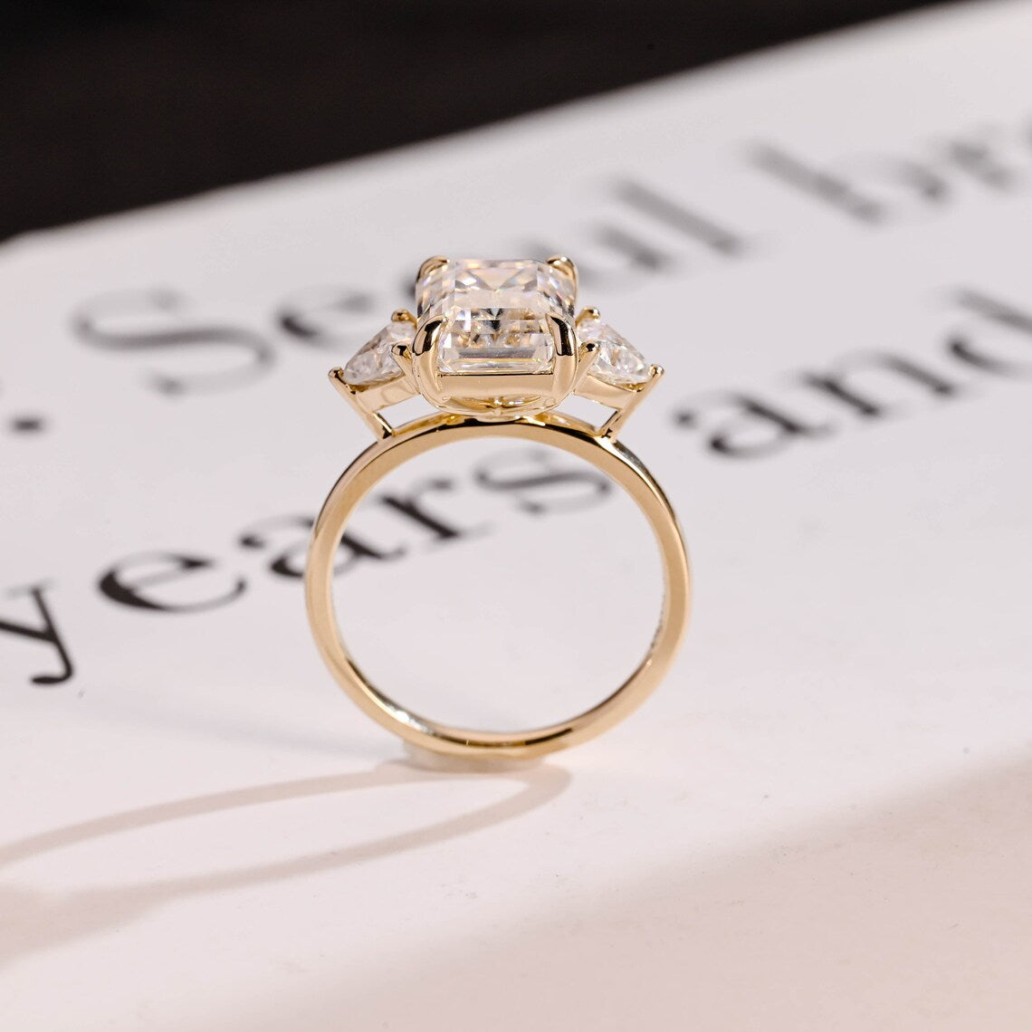 Three stone engagement ring
