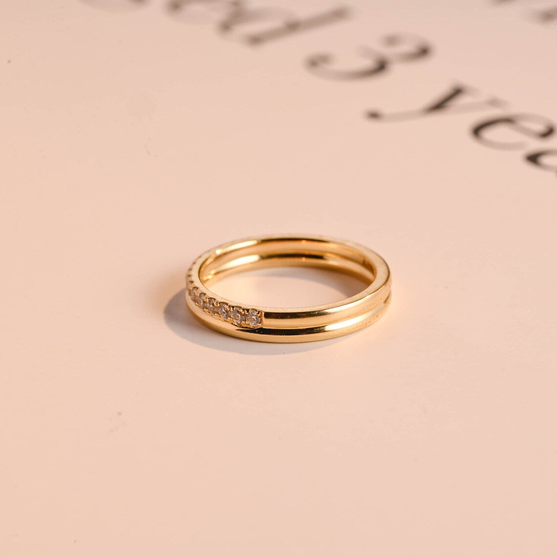 Gold half eternity ring
