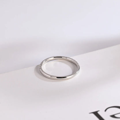 Dainty gold wedding band