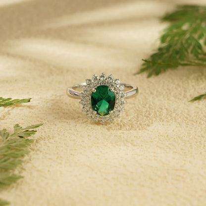 green stone engagement ring