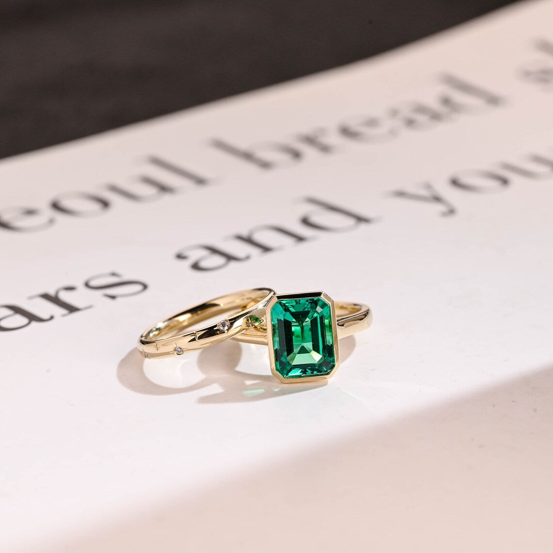 Green bezel emerald moissanite ring