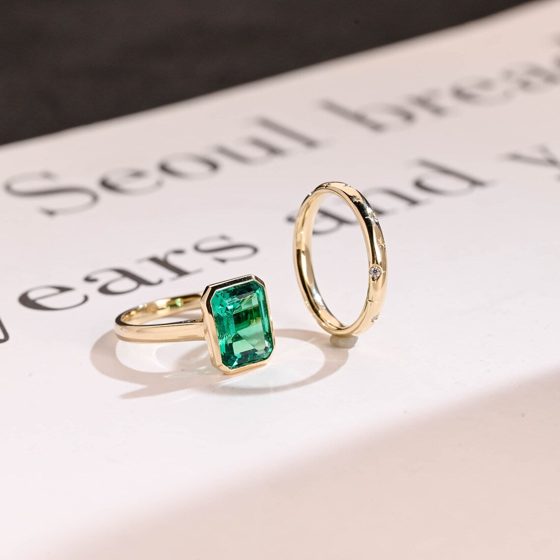 Green gemstone engagement ring