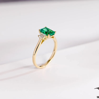 Green emerald cut moissanite ring
