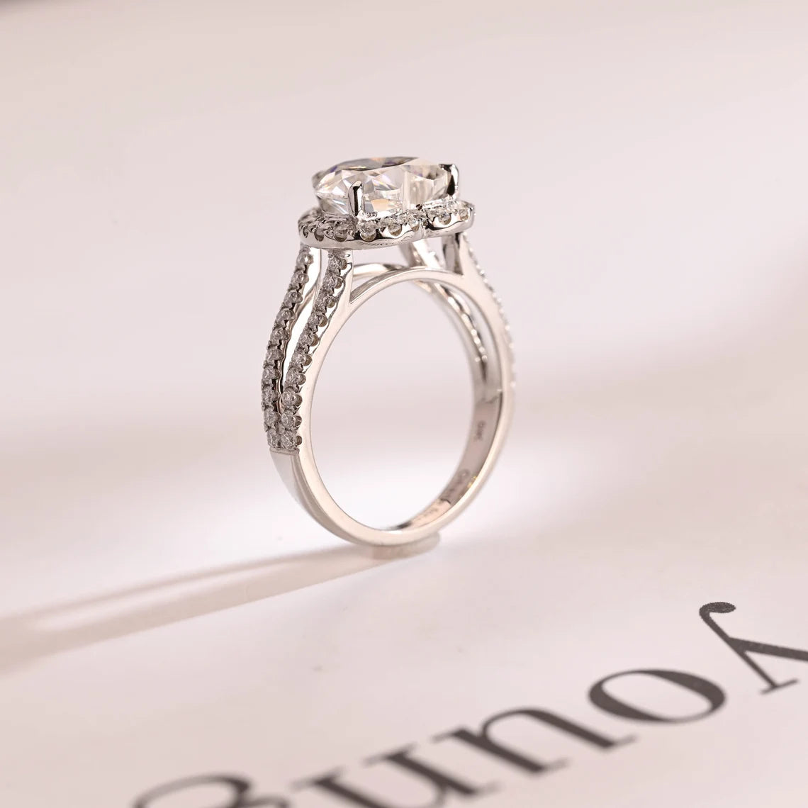 Single halo diamond ring