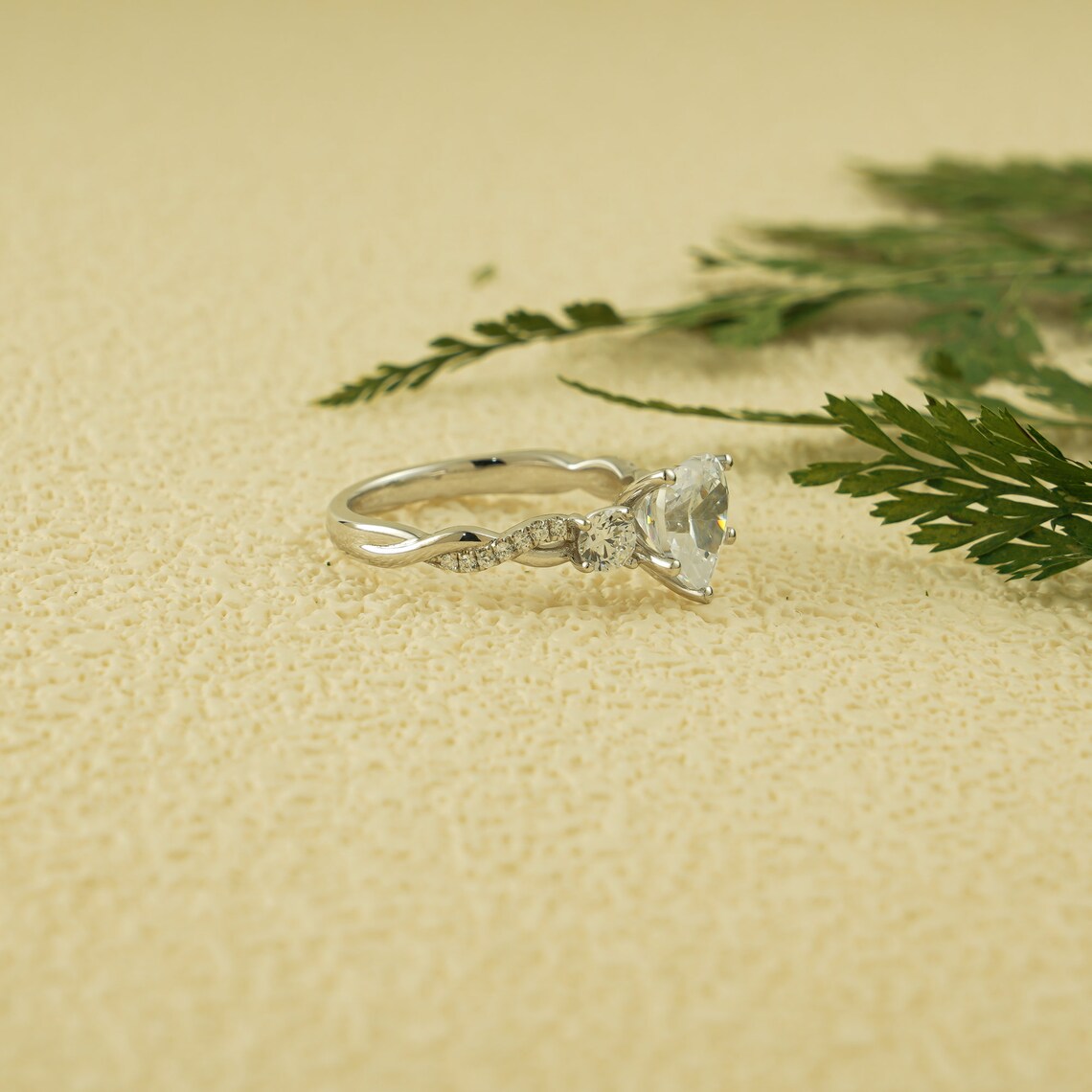 Crossover vine pave engagement ring