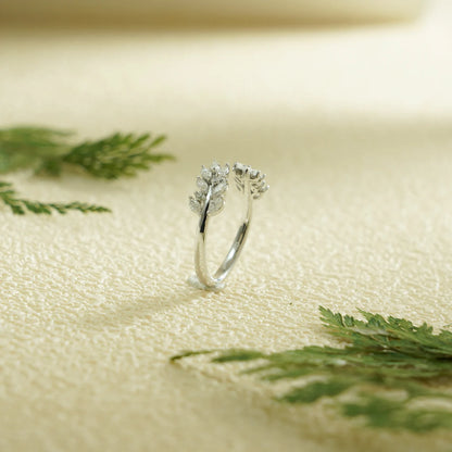 Round moissanite leaf ring