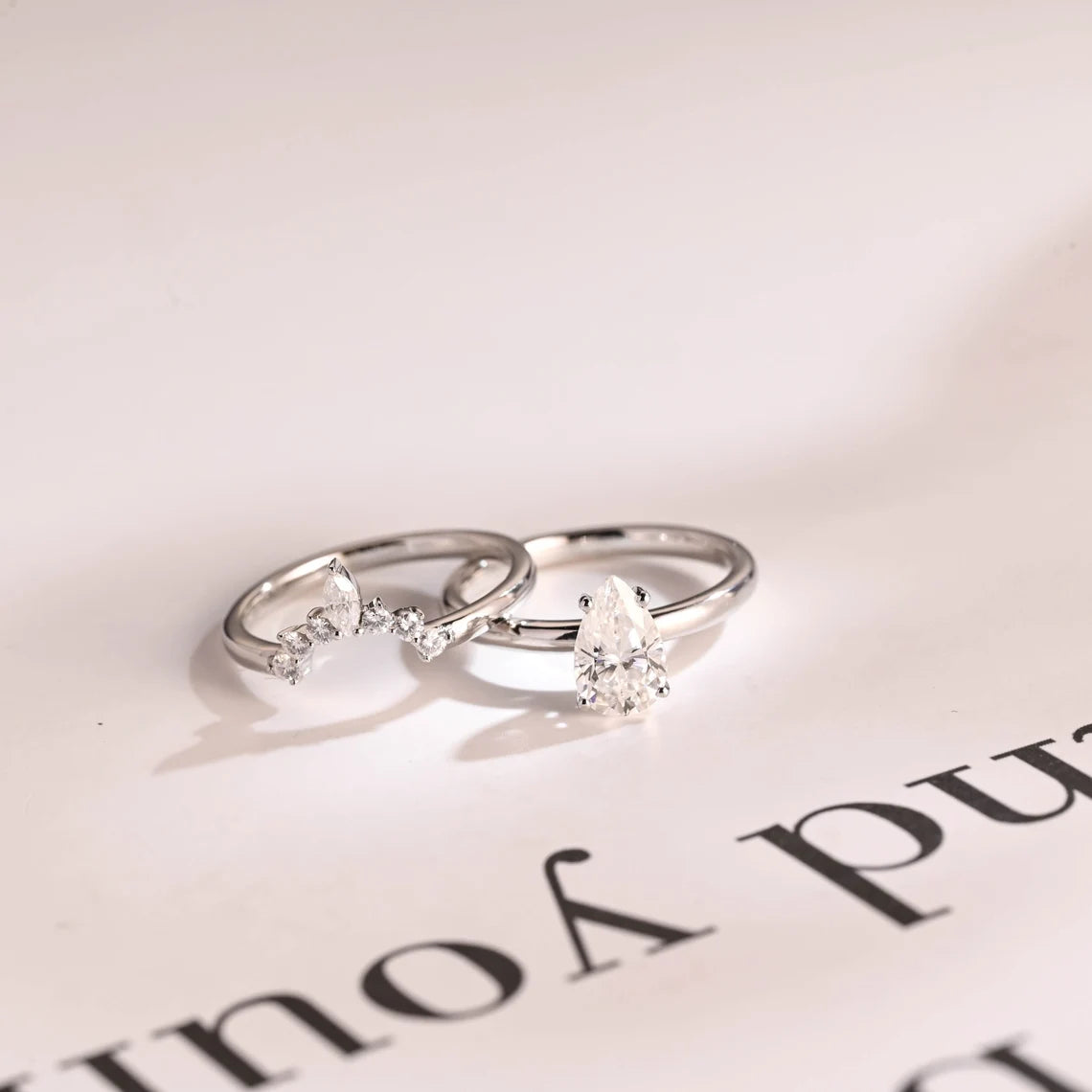 Pear cut moissanite diamond ring