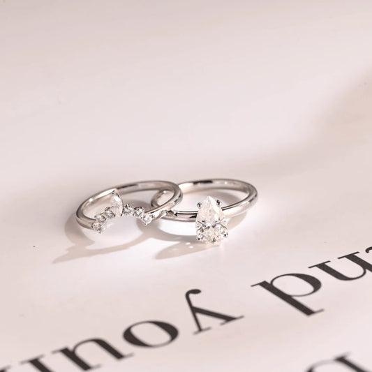 Pear cut moissanite diamond ring