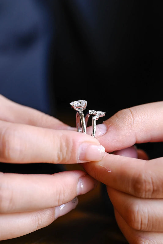 Pear cut moissanite diamond ring