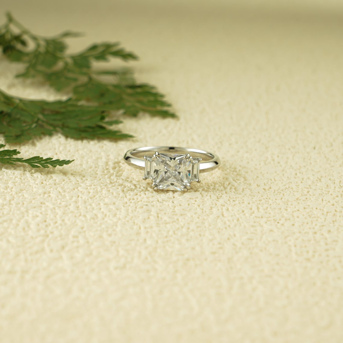 Three stone engagement ring