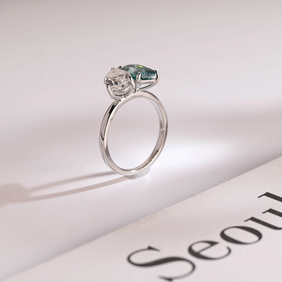 Light green radiant cut ring