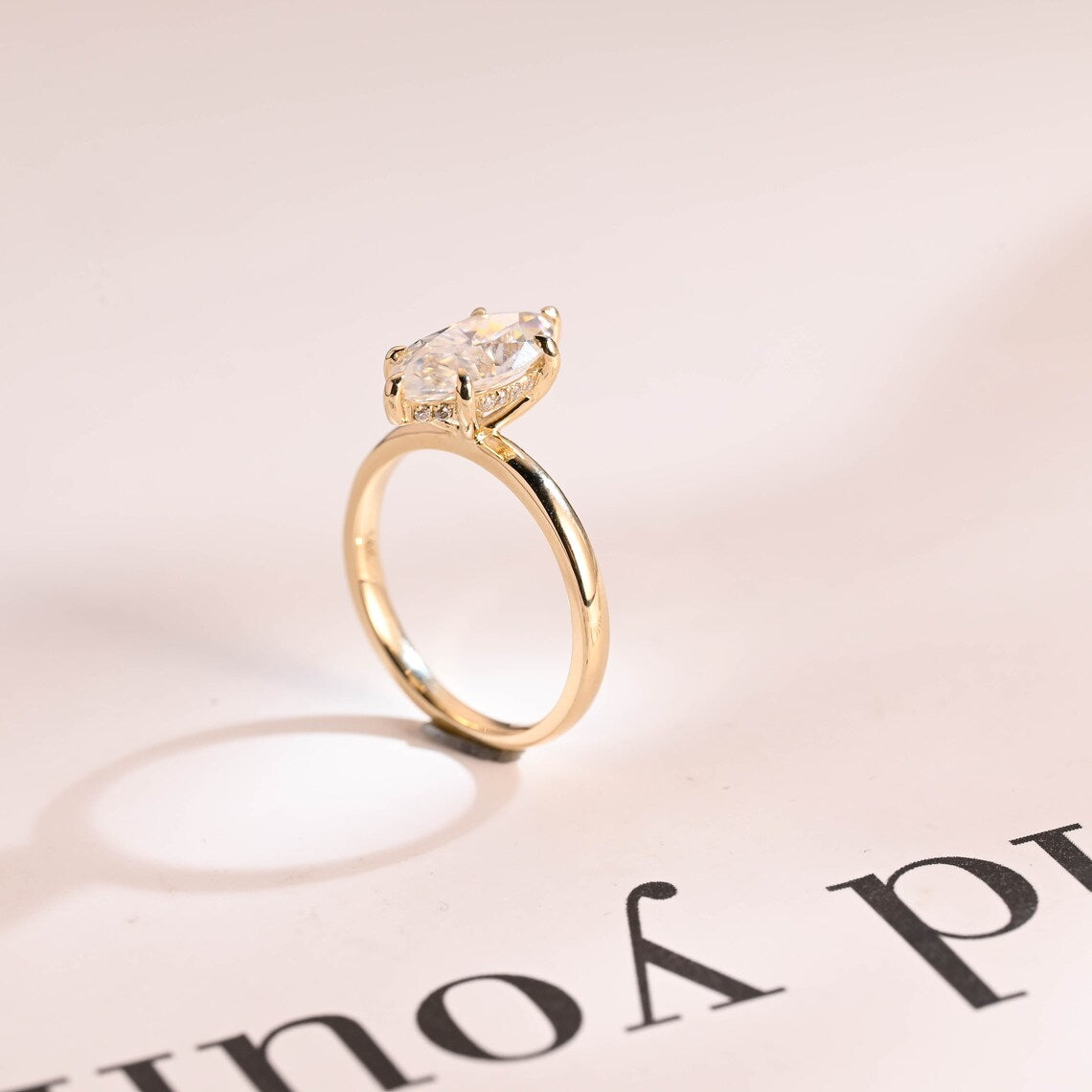 Hidden halo solitaire ring