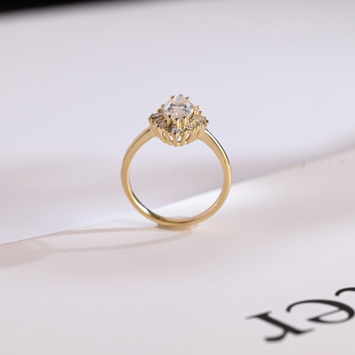 Cluster halo engagement ring