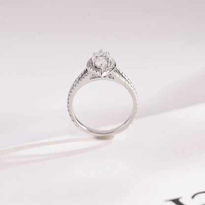 Moissanite halo engagement ring