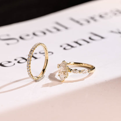 Side stone engagement ring