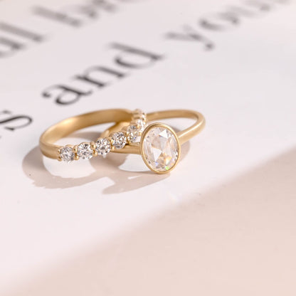 Bezel-set oval cut moissanite ring