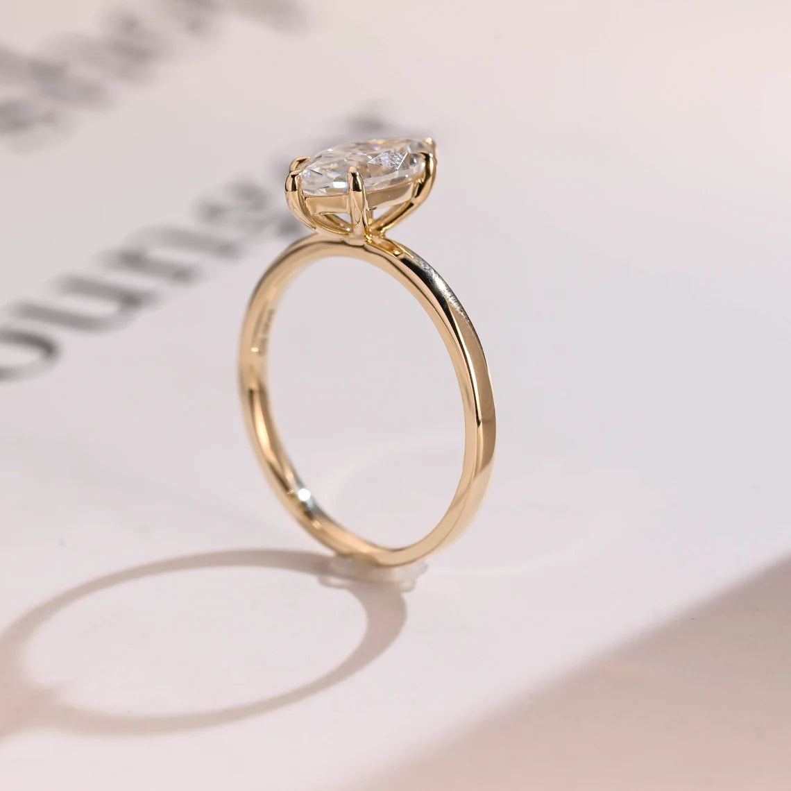 Claw prong-set moissanite ring