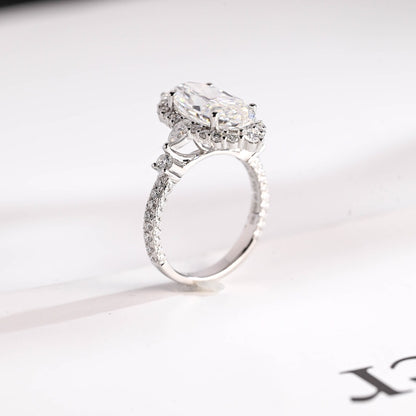 Pear And Round Side Stone Ring 