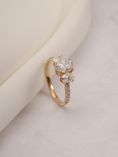Three stone engagement ring